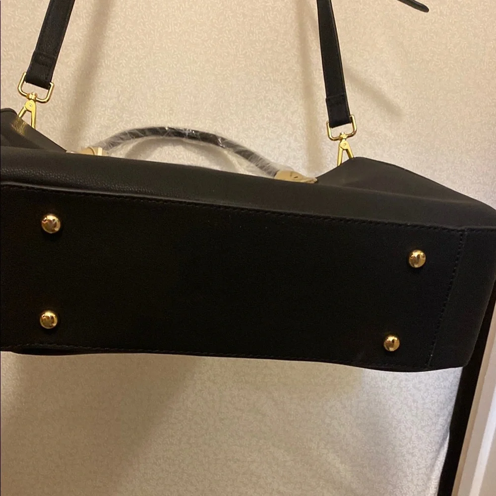 Elegant Black Handbag with Gold Accents